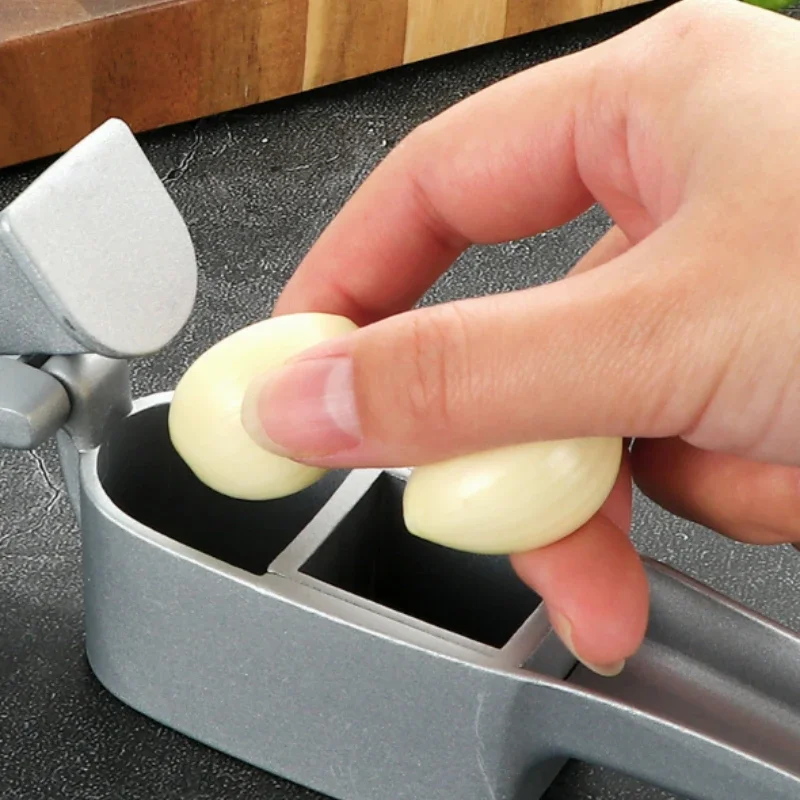 2 In 1 Multifunctional Garlic  – Watermelon Slicer Cutter Bewertung und Preis
